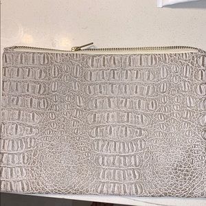 Snake skin clutch